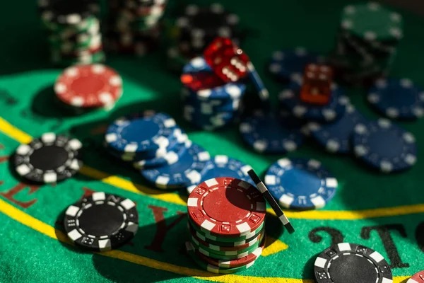 Live dealer at roulette table with betting layout and broadcast angle